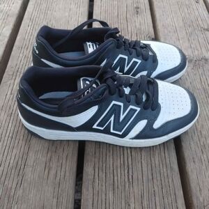 New Balance Men's Black and White Sneakers